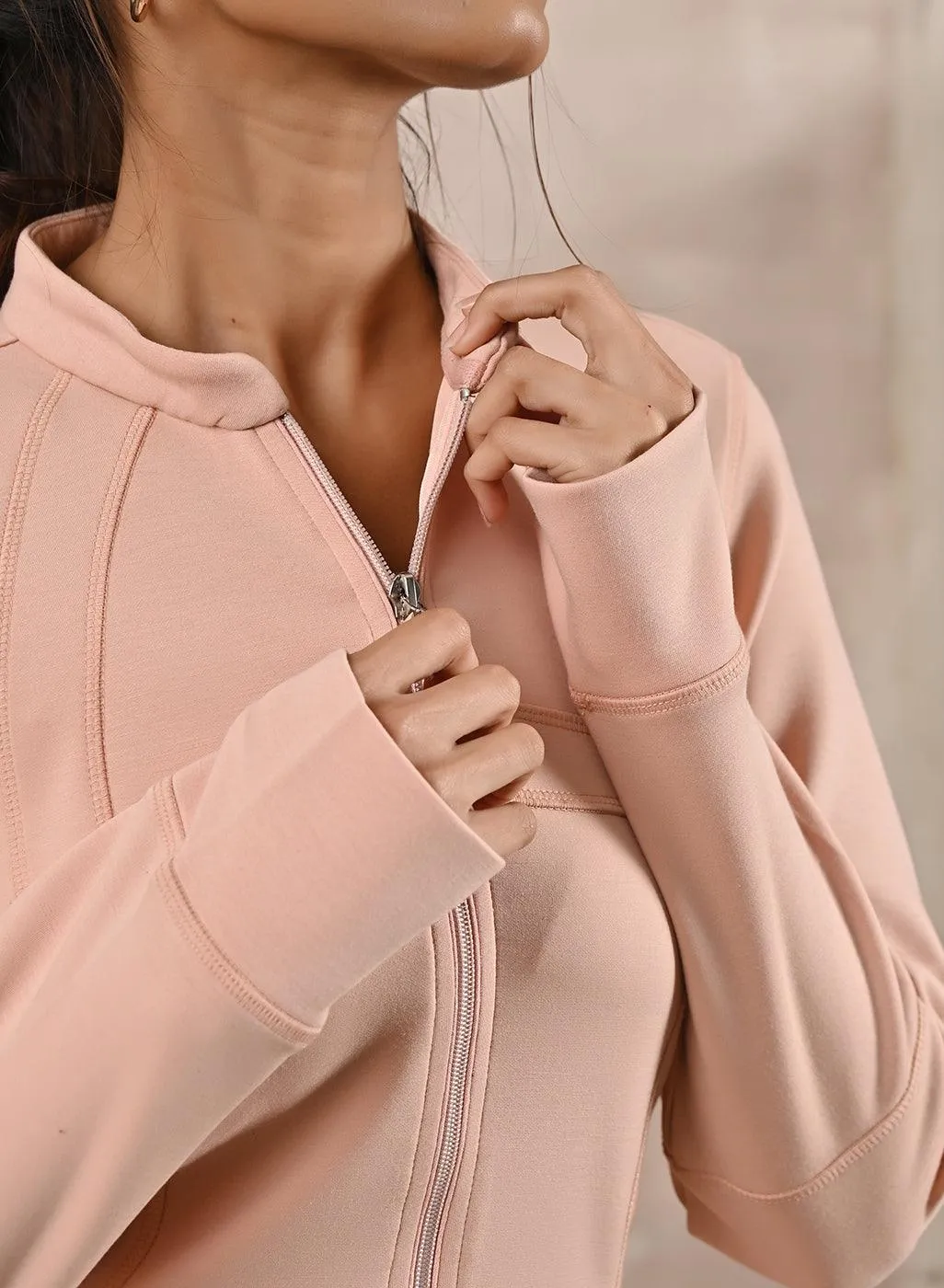 Stylish Peach Long-sleeve Jacket with Elegant Decorative Cuts